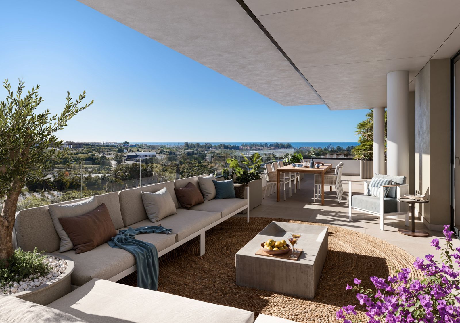 Modern living room with ocean view, outdoor dining, and large windows.